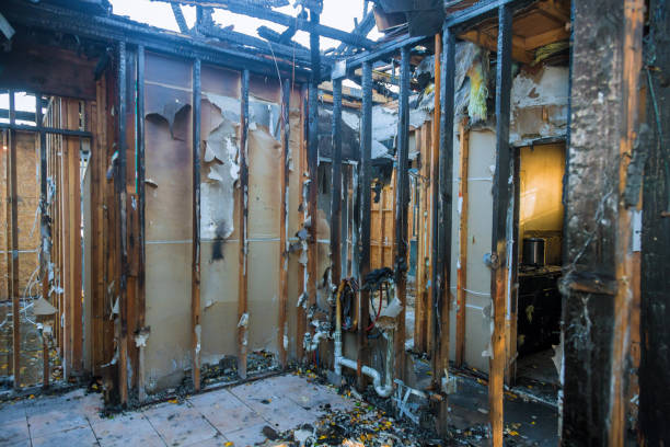 Professional Fire Damage Restoration technician working in Roberts, WI